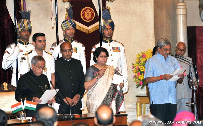 The President,  Pranab Mukherjee administering the oath as Cabinet Minister to  Manohar Parrikar, at a Swearing-in Ceremony, at Rashtrapati Bhavan, in New Delhi on November 09, 2014. 