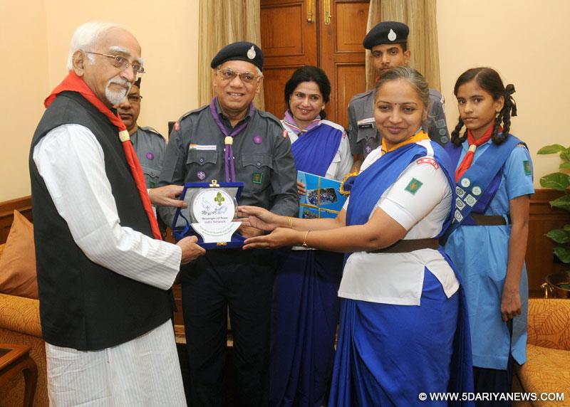 Mohd. Hamid Ansari, on the occasion of Bharat Scouts & Guides Flag Day, in New Delhi on November 10, 2014. 