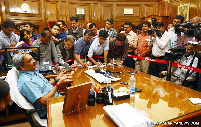 Manohar Parrikar interacting with the media after taking charge as new Defence Minister, in New Delhi on November 10, 2014. The DG (Media & Communication), Ministry of Defence, Sitanshu Kar is also seen.