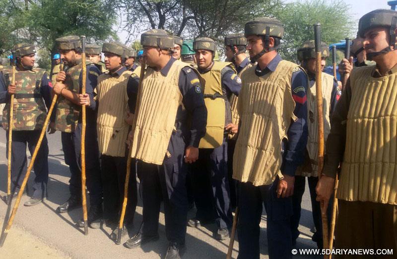 Barwala: Haryana Police personnel surround Satlok Ashram of self-styled godman and sect leader Rampal, near Barwala town in Haryana