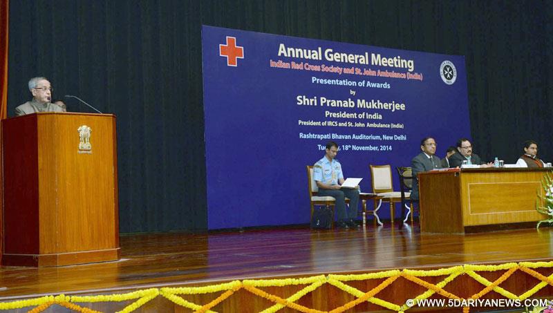 The President, Pranab Mukherjee addressing at the Annual General Meeting of Indian Red Cross Society (IRCS) and St. John Ambulance (India), at Rashtrapati Bhavan, in New Delhi on November 18, 2014. The Union Minister for Health & Family Welfare,  Jagat Prakash Nadda is also seen.