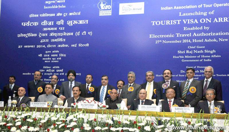The Union Home Minister,  Rajnath Singh and Dr. Mahesh Sharma at the launch of the “Tourist Visa on Arrival enabled by Electronic Travel Authorization (ETA)”, in New Delhi on November 27, 2014. 