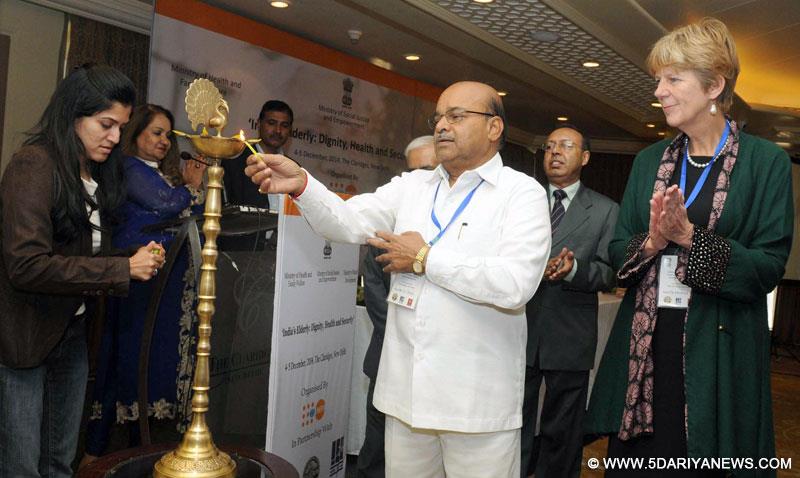 Thaawar Chand Gehlot lighting the lamp at the two day’s National Conference on Elderly: Dignity, Health and Security, in New Delhi on December 04, 2014