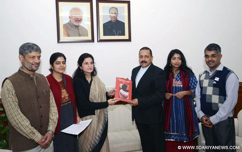 Anjali Bhardwaj, Amrita Johri and the Nikhil Dey presented a copy of the report 