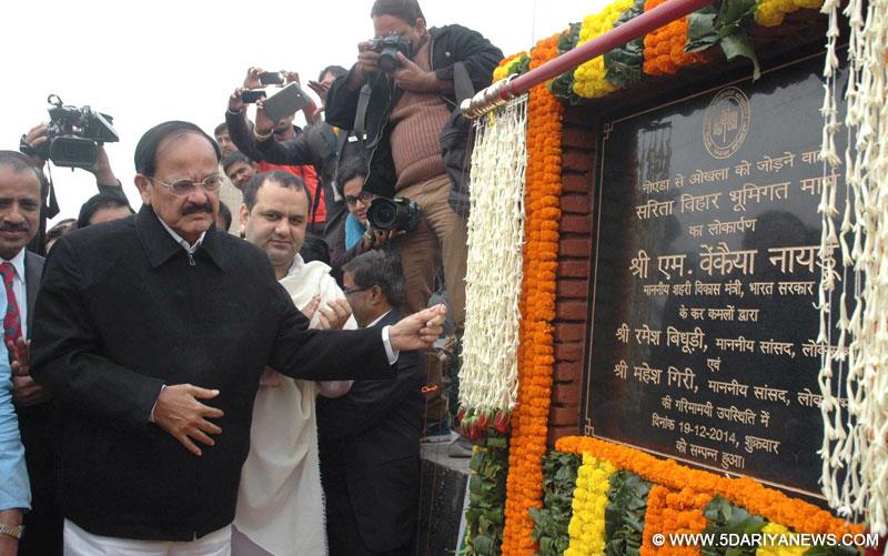 M. Venkaiah Naidu inaugurating the three additional clover leaves to flyover including slip roads/ approach roads, bridge, footpath, cycle track and under pass, at SaritaVihar Bridge, in New Delhi on December 19, 2014.