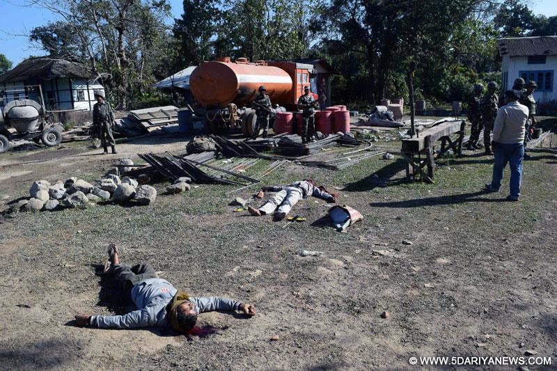 Bodies of the villagers killed in a raid carried out by Bodo militants in Kokrajhar village being removed on Dec 24, 2014.