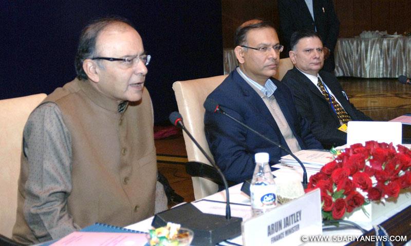 Arun Jaitley holding a Pre Budget meeting with the State Finance Ministers, in New Delhi on December 26, 2014. The Minister of State for Finance, Jayant Sinha is also seen.