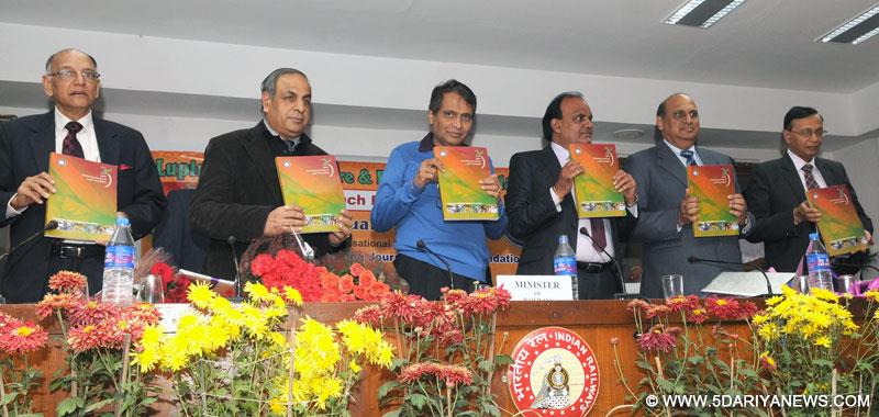 Suresh Prabhakar Prabhu releasing a book on “Twenty Five Years Pioneering Journey of Lupin Foundation” brought out by the Lupin Human Welfare & Research Foundation, in New Delhi on January 06, 2015.