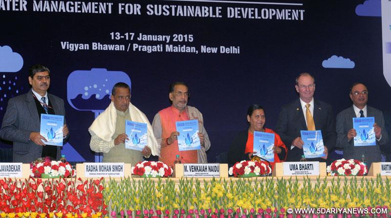Uma Bharti releasing a book at the inauguration of the India Water Week 2015, in New Delhi 