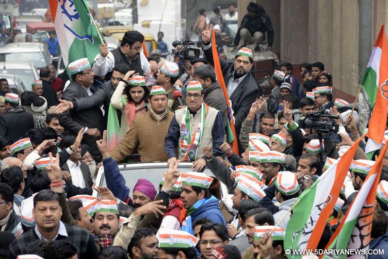 Congress leader Ajay Maken during a roadshow before filing his nomination papers in in New Delhi, on Jan 21, 2015.