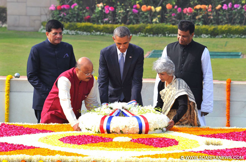 Barack Obama laying wreath at the Samadhi of Mahatma Gandhi, at Rajghat, in Delhi 