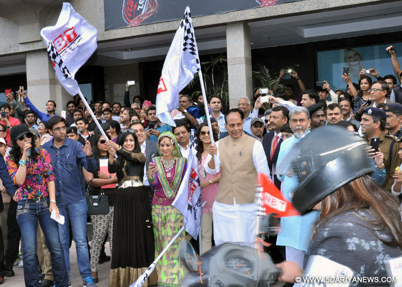 The Union Home Minister, Rajnath Singh flagging off a Bike Rally on the occasion of the International Women’s Day, in New Delhi on March 08, 2015. 