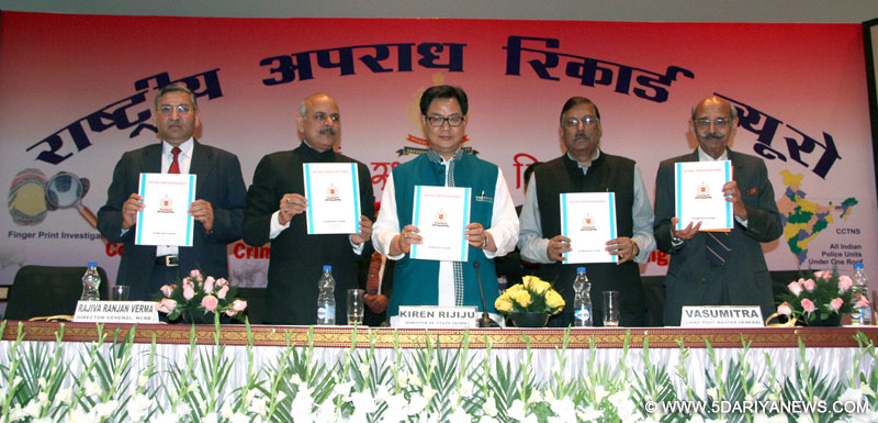 Kiren Rijiju releasing a souvenir on the occasion of the 30th Raising Day Function of Central Crime Records Bureau, in New Delhi on March 11, 2015.