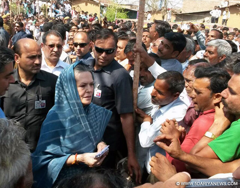Congress president Sonia Gandhi interacts with people during her visit to Kota of Rajasthan on March 20, 2015.