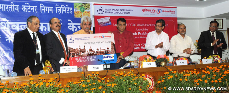 Suresh Prabhakar Prabhu launching the IRCTC Union Bank RuPay Prepaid card, at a function, in New Delhi on March 24, 2015. 
