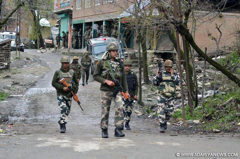 Baramulla:Security personnel at the spot of the gunbattle between guerrillas and security forces where a police official was killed and two soldiers were injured in Kashmir