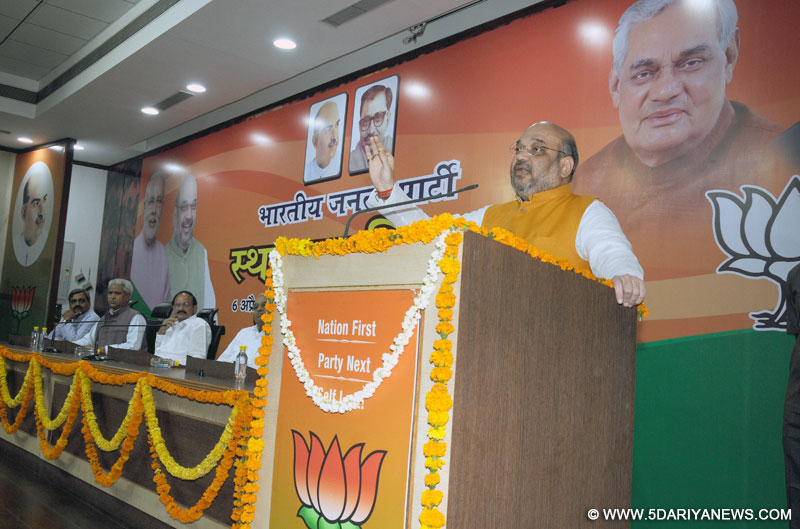 BJP chief Amit Shah addresses during a programme organised on the foundation day of the party in New Delhi on April 6, 2015. 