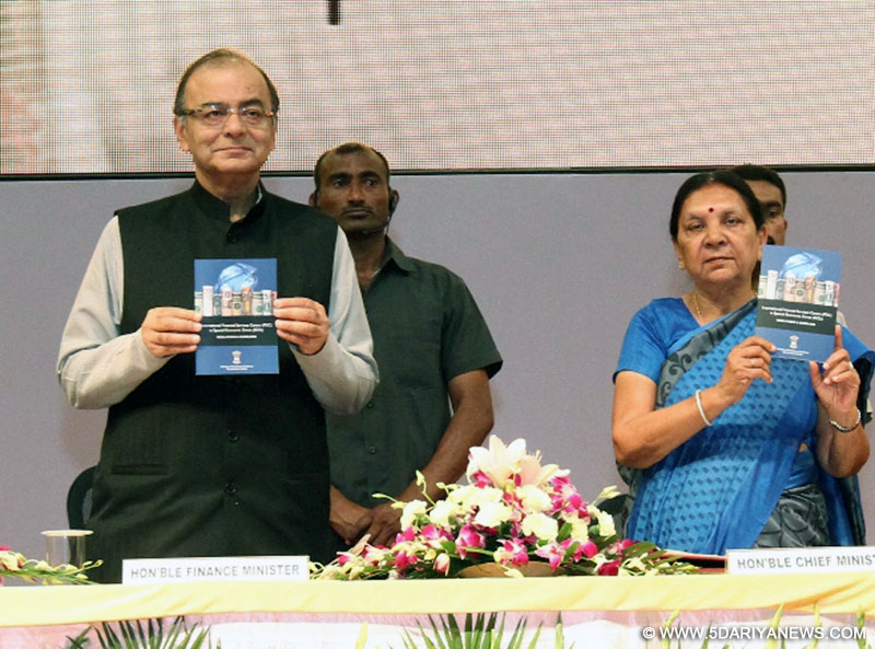 Gandhinagar: Union Minister for Finance, Corporate Affairs, and Information and Broadcasting Arun Jaitley with Gujarat Chief Minister Anandiben Patel during the inauguration of the International Financial Service Centre (IFSC) at Mahatma Mandir in Gandhinagar on April 10, 2015. 