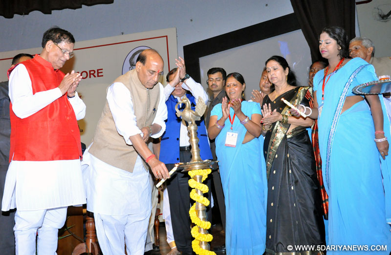 The Union Home Minister, Rajnath Singh lighting the lamp to inaugurate the National Seminar on "Untouchability no more", in New Delhi on April 13, 2015.
