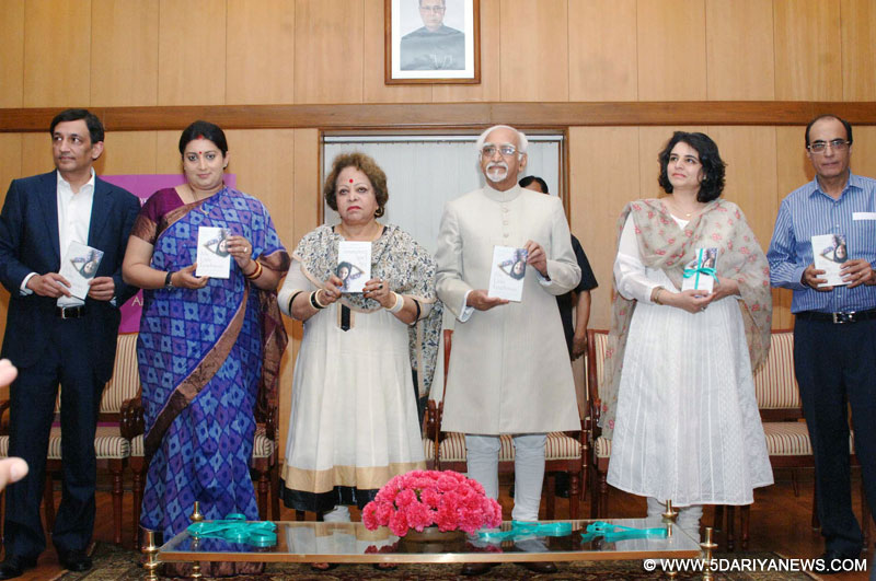 The Vice President, Mohd. Hamid Ansari releasing a book entitled "My Little Epiphanies", written by Late Ms. Aisha Chaudhary, in New Delhi on April 13, 2015. Smt. Salma Ansari and the Union Minister for Human Resource Development, Smriti Irani are also seen.