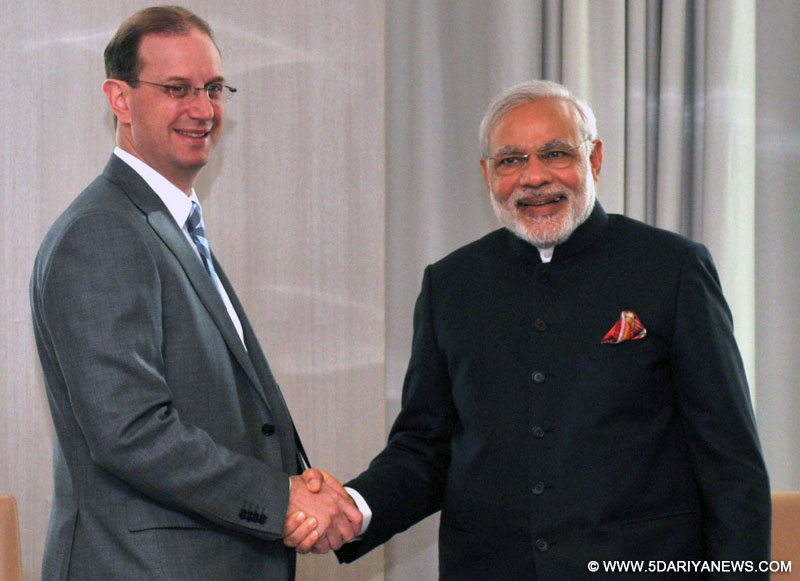 The Prime Minister, Narendra Modi meeting the CEO of the Canada Pension Plan Investment Board, Mr. Mark Wiseman, in Toronto, Canada on April 16, 2015. 