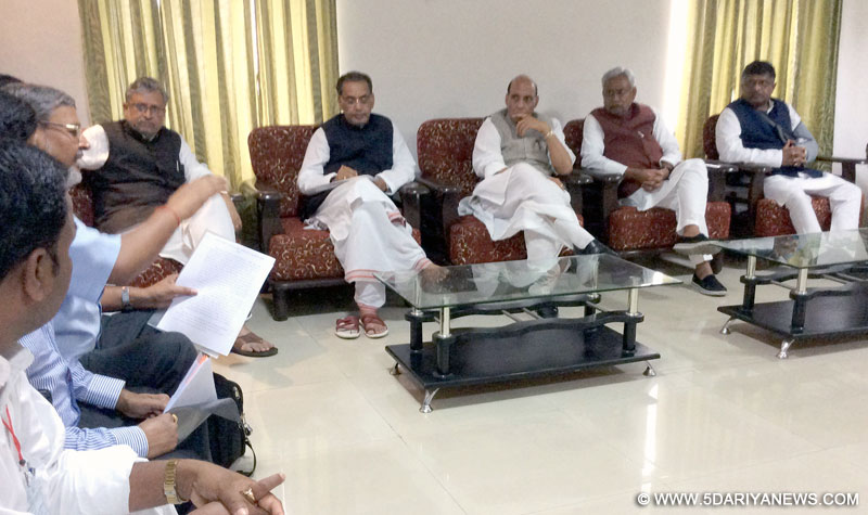 Rajnath Singh reviewing the situation of cyclone affected districts of Madhepura and Purnia of Bihar with the Chief Minister, Nitish Kumar, in Madhepura, Bihar on April 24, 2015. 