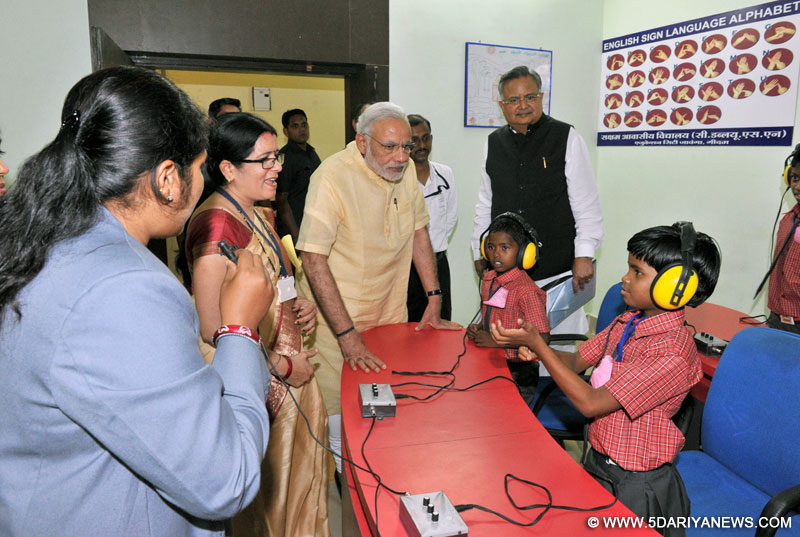 The Prime Minister, Narendra Modi interacting with specially abled children, at Saksham Education City, Jawanga, Dantewada, in Chhattisgarh on May 09, 2015. The Chief Minister of Chhattisgarh, Dr. Raman Singh is also seen.