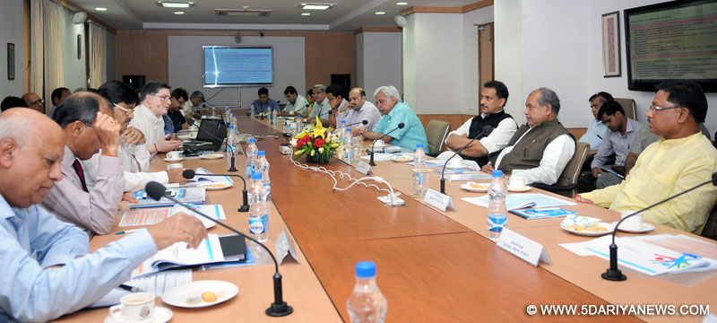 Narendra Singh Tomar holding a meeting,Rajiv Pratap Rudy along with the Heads of PSUs of Steel Ministry, in New Delhi on May 12, 2015. 