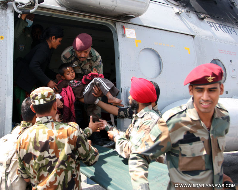 Casualties brought from Lamabagar to Kathmandu by an Indian Air Force (IAF) Mi-17 V5, being received by the Indian Paramedical team, post a recent massive earthquake occurred in Nepal on May 13, 2015.