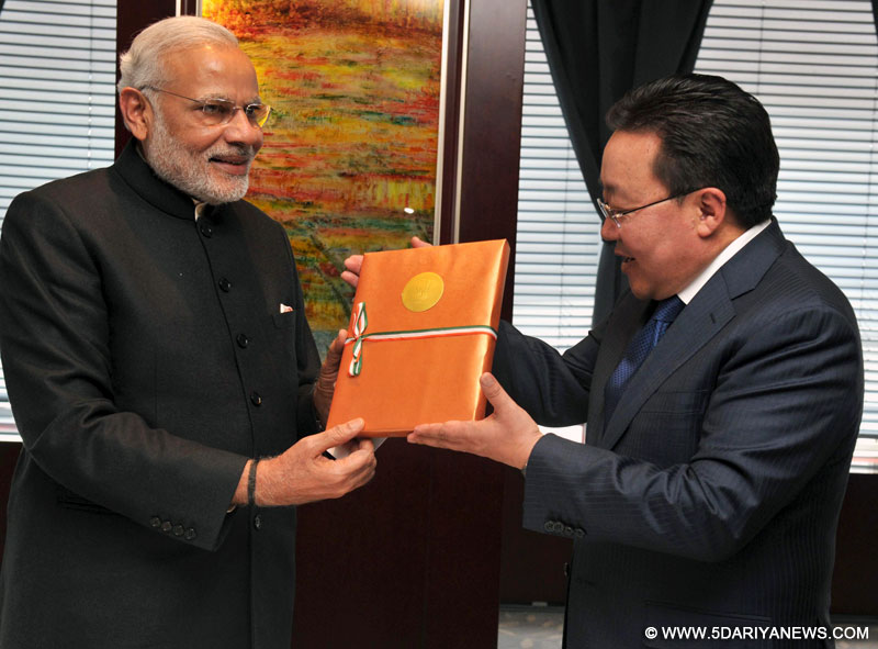 The Prime Minister,  Narendra Modi’s gift to the President of Mongolia, Tsakhiagiin Elbegdorj, in Mongolia on May 17, 2015.
