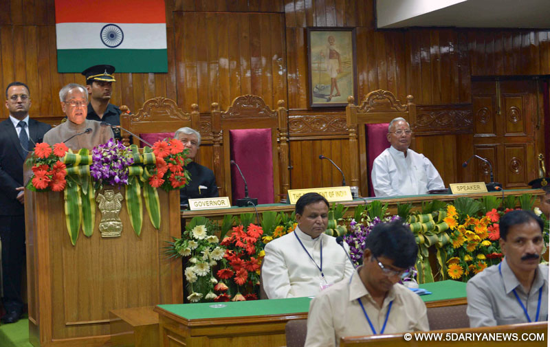 The President, Pranab Mukherjee addressing at the special session of the Uttarakhand Legislative Assembly, in Uttarakhand on May 18, 2015. The Governor of Uttarakhand, Dr. K.K. Paul is also seen.