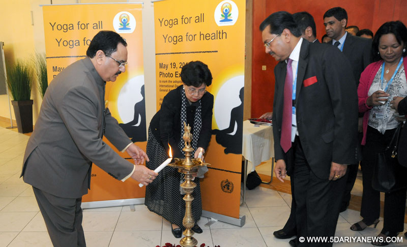 Jagat Prakash Nadda lighting the lamp to inaugurate the Photo Exhibition “Yoga for All, Yoga for Health”, organised on the sidelines of the World Health Assembly, at Geneva on May 19, 2015. The Director-General of World Health Organization, Dr. Margaret Chan is also seen. 