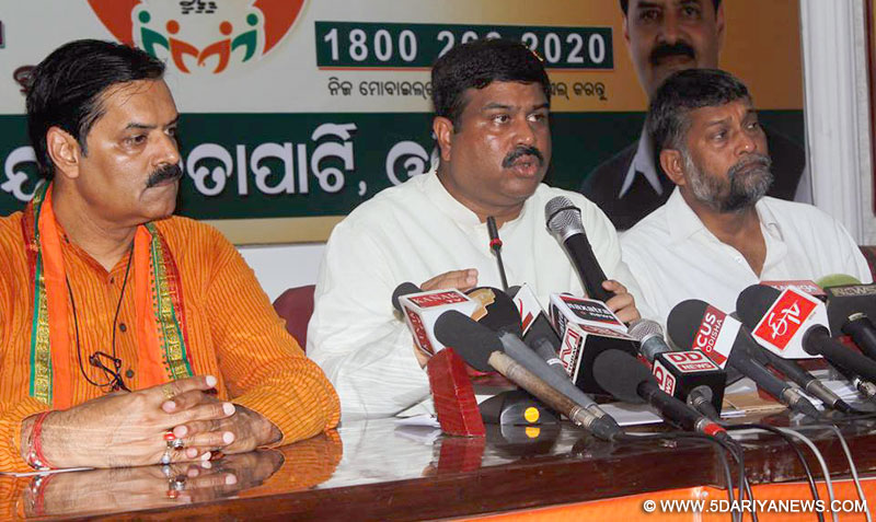 Dharmendra Pradhan addressing a press conference on the one year completion of NDA Government, in Bhubaneswar on May 26, 2015.
