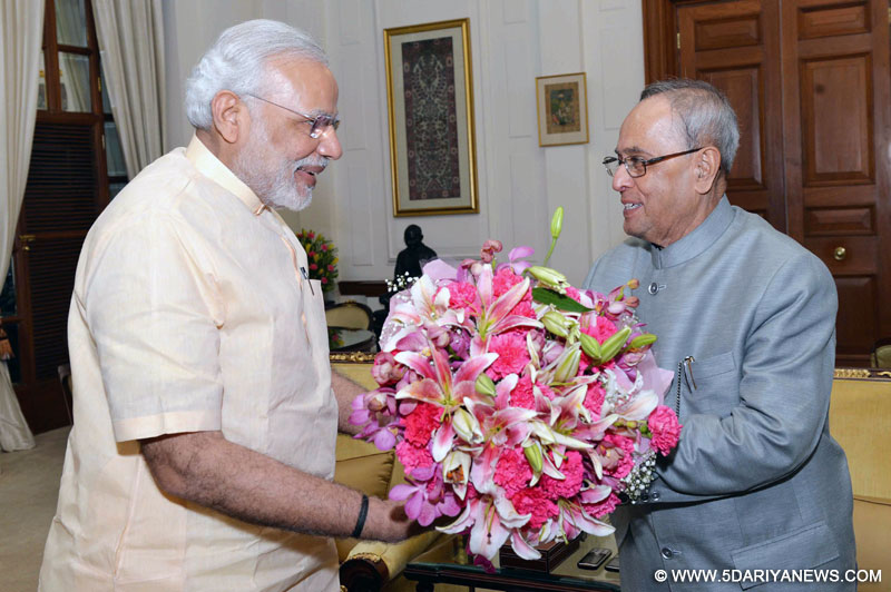 The Prime Minister,  Narendra Modi calling on the President, Pranab Mukherjee, at Rashtrapati Bhavan, in New Delhi on May 26, 2015. 