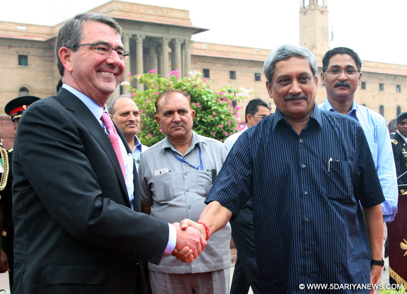 The Defence Secretary of US, Dr. Ashton Carter being received by the Union Minister for Defence, Manohar Parrikar, in New Delhi on June 03, 2015.