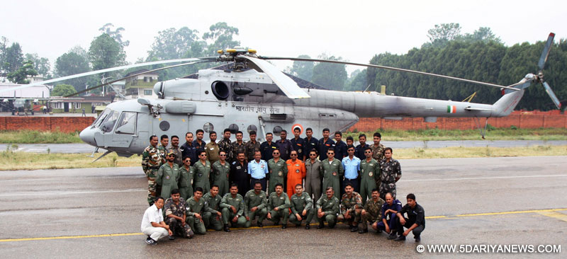 Indian Air Force (IAF) crew along with the Army personnel who undertook day & night operations during recent Nepal earthquake, at Kathmandu Airport on conclusion of operations that came to an end on June 04, 2015.