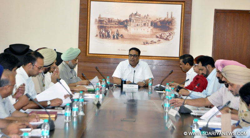 Punjab Chief Secretary Sarvesh Kaushal chairing a State level meeting to review the progress of administrative preparations for commemoration of 350th Foundation Day of Sri Anandpur Sahib on June 9, 2015 