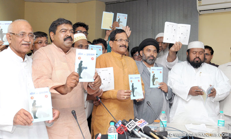 The Minister of State for AYUSH (Independent Charge) and Health & Family Welfare, Shripad Yesso Naik releasing a book titled ‘Yoga and Islam’, at a function, in New Delhi on June 17, 2015.