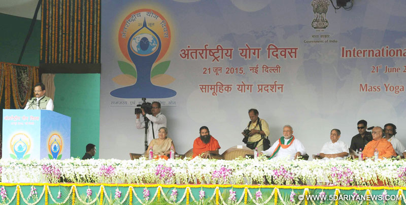 The Minister of State for AYUSH (Independent Charge) and Health & Family Welfare,  Shripad Yesso Naik addressing the gathering on the occasion of International Yoga Day, in New Delhi on June 21, 2015. The Prime Minister, Narendra Modi and other dignitaries are also seen.