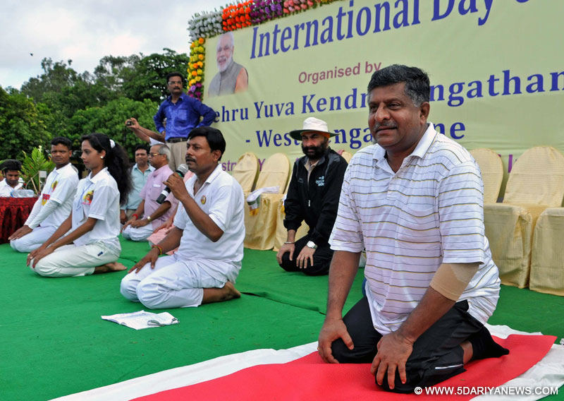 Kolkata: Union Minister for IT and Communications Ravi shankar Prasadduring a Yoga Day programme organised at Sports Authority of India complexin Kolkata, on June 21, 2015.
