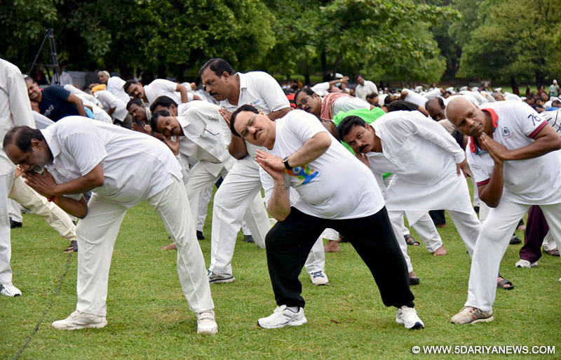 The Union Minister for Health and Family Welfare, J.P. Nadda participates in the mass yoga demonstration, on the occasion of International Yoga Day, in Hyderabad on June 21, 2015.
