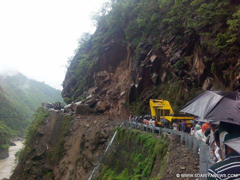Badrinath: Pilgrims stranded as the Rishikesh-Badrinath Highway has been blocked due to landslide in Badrinath, Uttarakhand on July 6, 2015. 