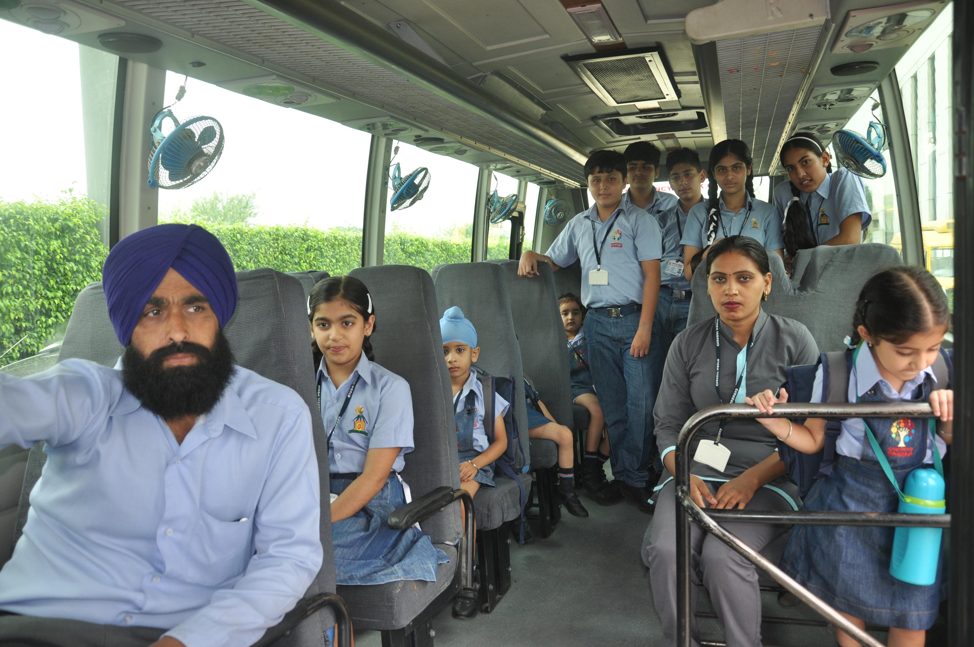 "Students traveling in a bus of  Gurukul World School, Mohali in a jubiiant mood after the school incorporated safety norms in its buses."