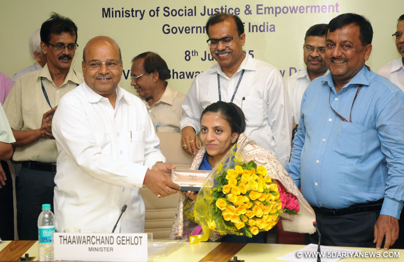  Thaawar Chand Gehlot felicitating Ms. Ira Singhal, topper of the Indian Civil Services-2014 Examination, in New Delhi on July 08, 2015.
