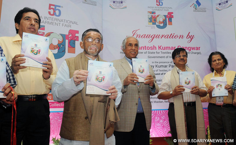 Santosh Kumar Gangwar releasing a brochure, at the inauguration of the 55th India International Garment Fair, in New Delhi on July 13, 2015. 