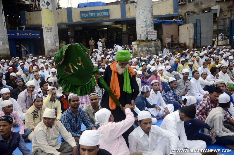 : Muslims offer namaz on the occasion of Eid-ul-Fitr in Mumbai on July 18, 2015. 
