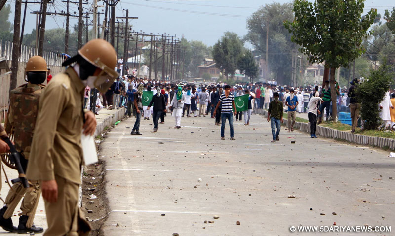 Stone-pelting youths took to the streets in the Safa Kadal area of old city Srinagar after the Eid-ul-Fitr prayers as police and Central Reserve Police Force (CRPF) personnel used batons and tear smoke canisters to disperse the protesters on July 18, 2015.