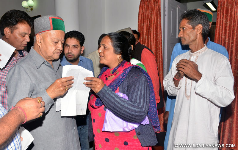 Chief Minister Virbhadra Singh listening to public grievances at Shimla on 21 July 2015.