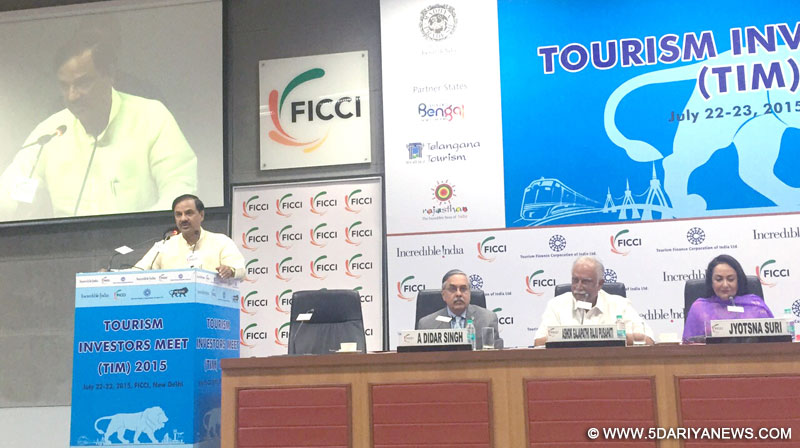  Dr. Mahesh Sharma addressing at the Tourism Investors Meet, organised by the FICCI, in New Delhi on July 23, 2015. The Union Minister for Civil Aviation, Shri Ashok Gajapathi Raju Pusapati and the President, FICCI, Dr. Jyotsna Suri are also seen.