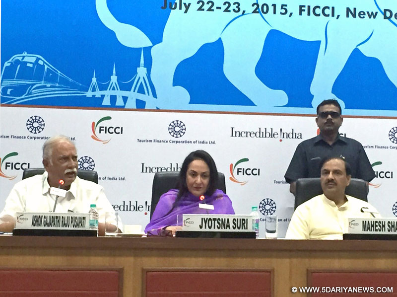 The Union Minister for Civil Aviation, Shri Ashok Gajapathi Raju Pusapati addressing the Tourism Investors Meet, organised by the FICCI, in New Delhi on July 23, 2015. The Minister of State for Culture (Independent Charge), Tourism (Independent Charge) and Civil Aviation, Dr. Mahesh Sharma and the President, FICCI, Dr. Jyotsna Suri are also seen.